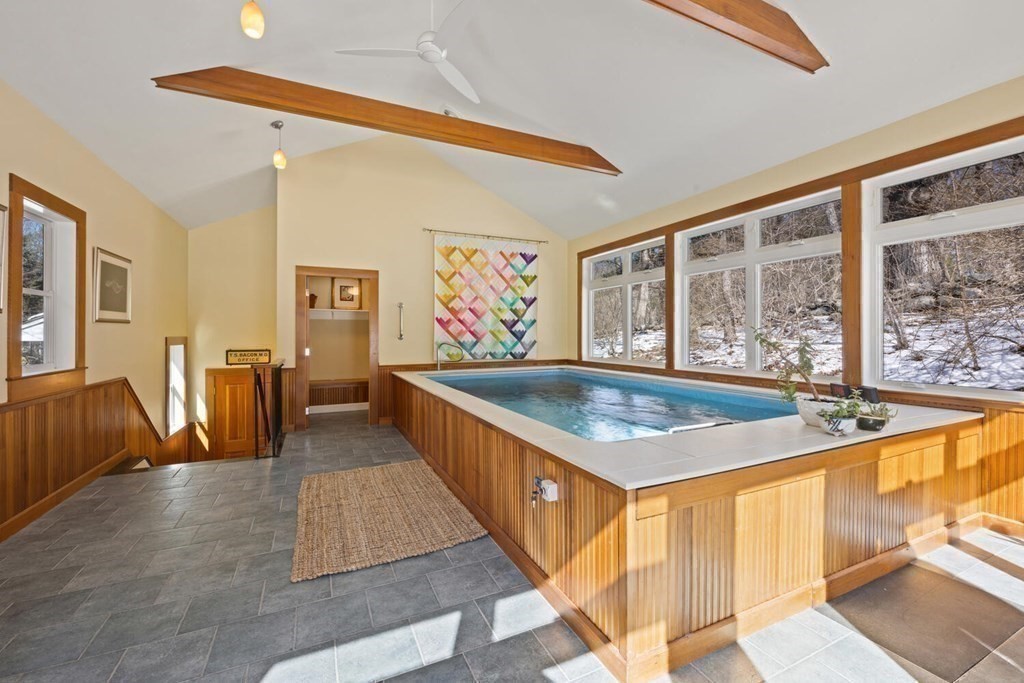 410 Lowell Road Concord, MA 01742 - Photo 20 of 36 a room with pool table and glass windows