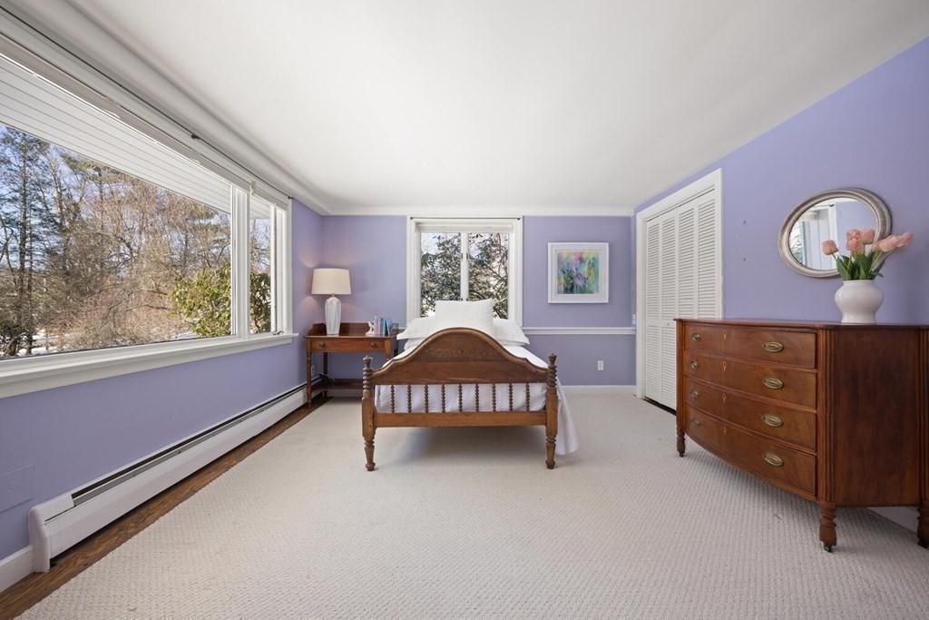 410 Lowell Road Concord, MA 01742 - Photo 23 of 36 a living room with a bed furniture and a window