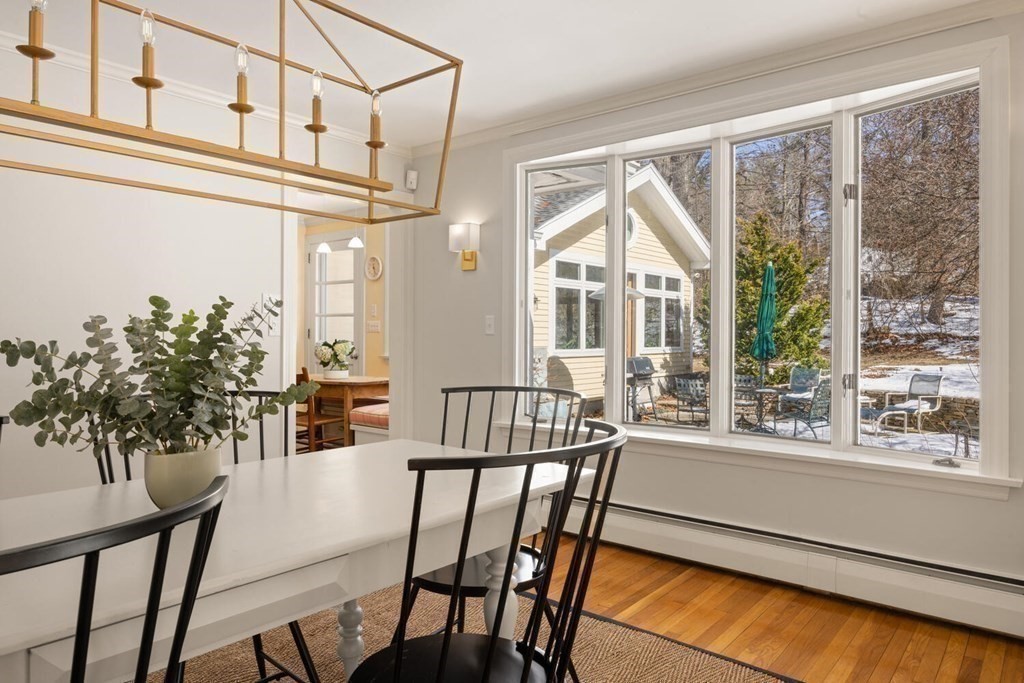 410 Lowell Road Concord, MA 01742 - Photo 9 of 36 a view of a dining room with furniture window and outside view