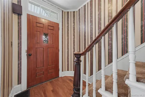 a view of an entryway with staircase