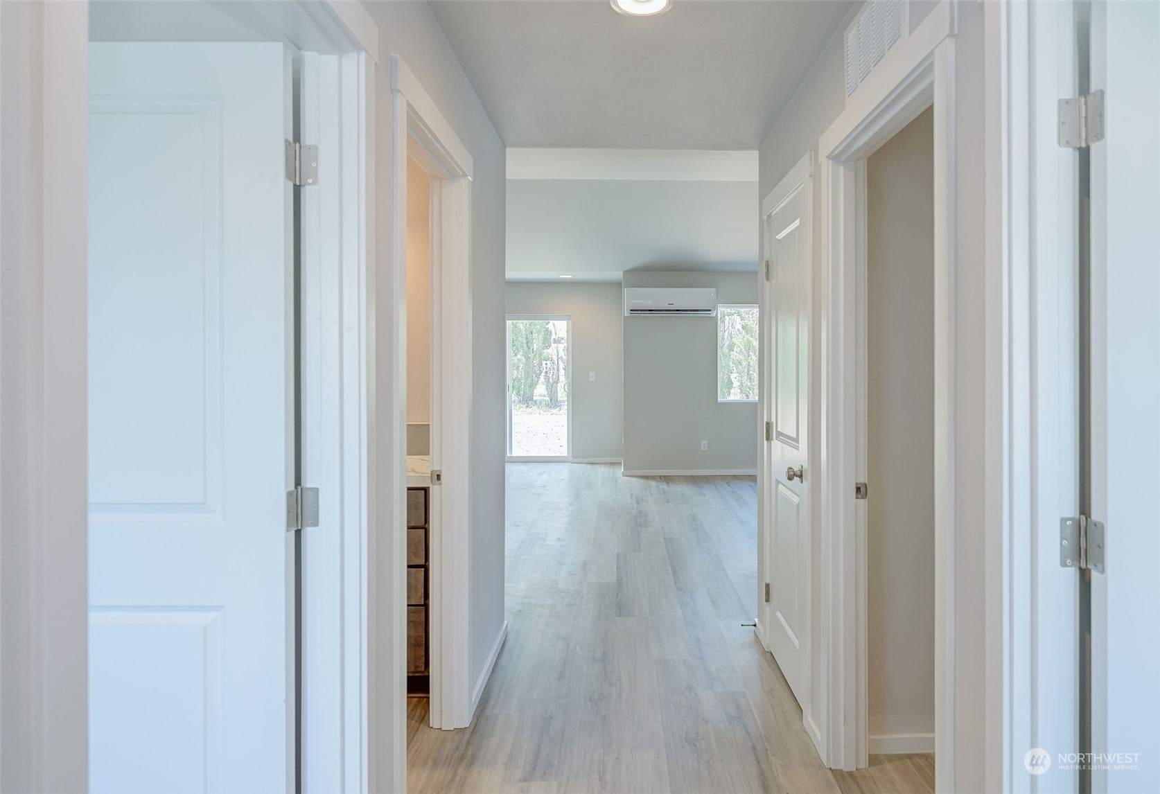 101 Walnut Street Tieton, WA 98947 - Photo 3 of 27 a view of a hallway with wooden floor