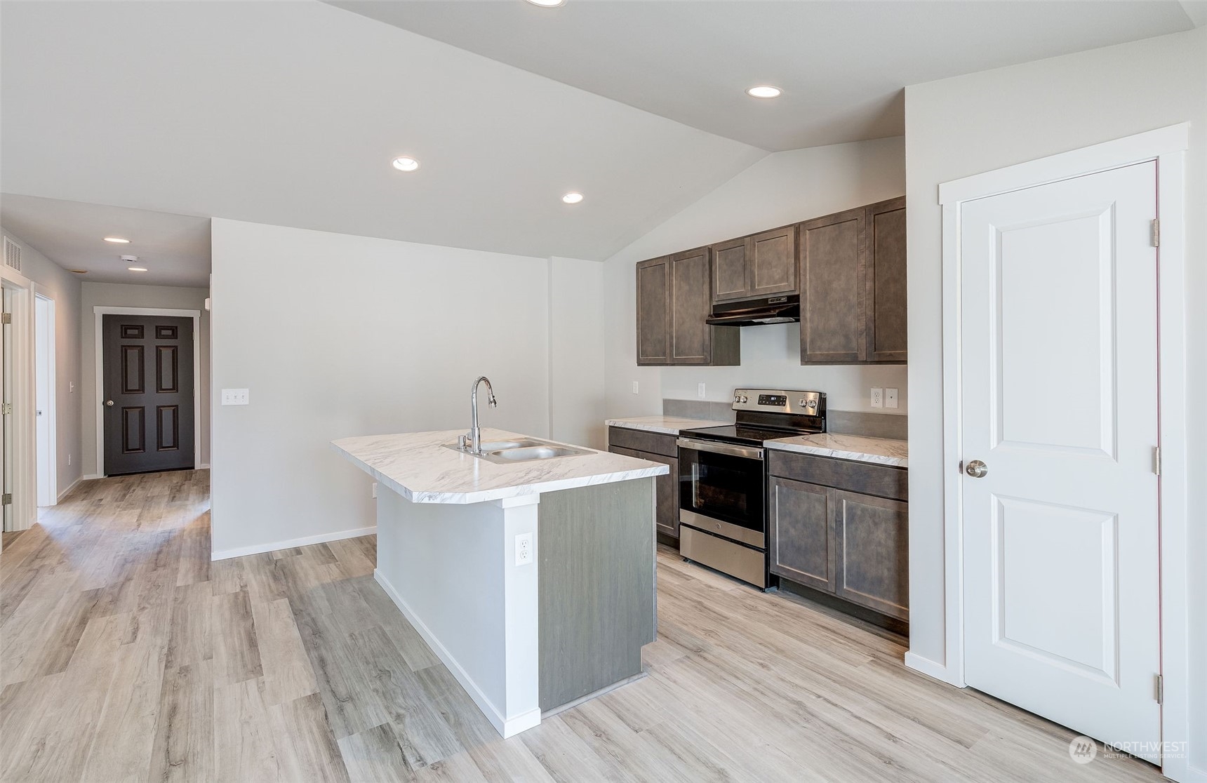 101 Walnut Street Tieton, WA 98947 - Photo 7 of 27 a kitchen with a sink and a refrigerator