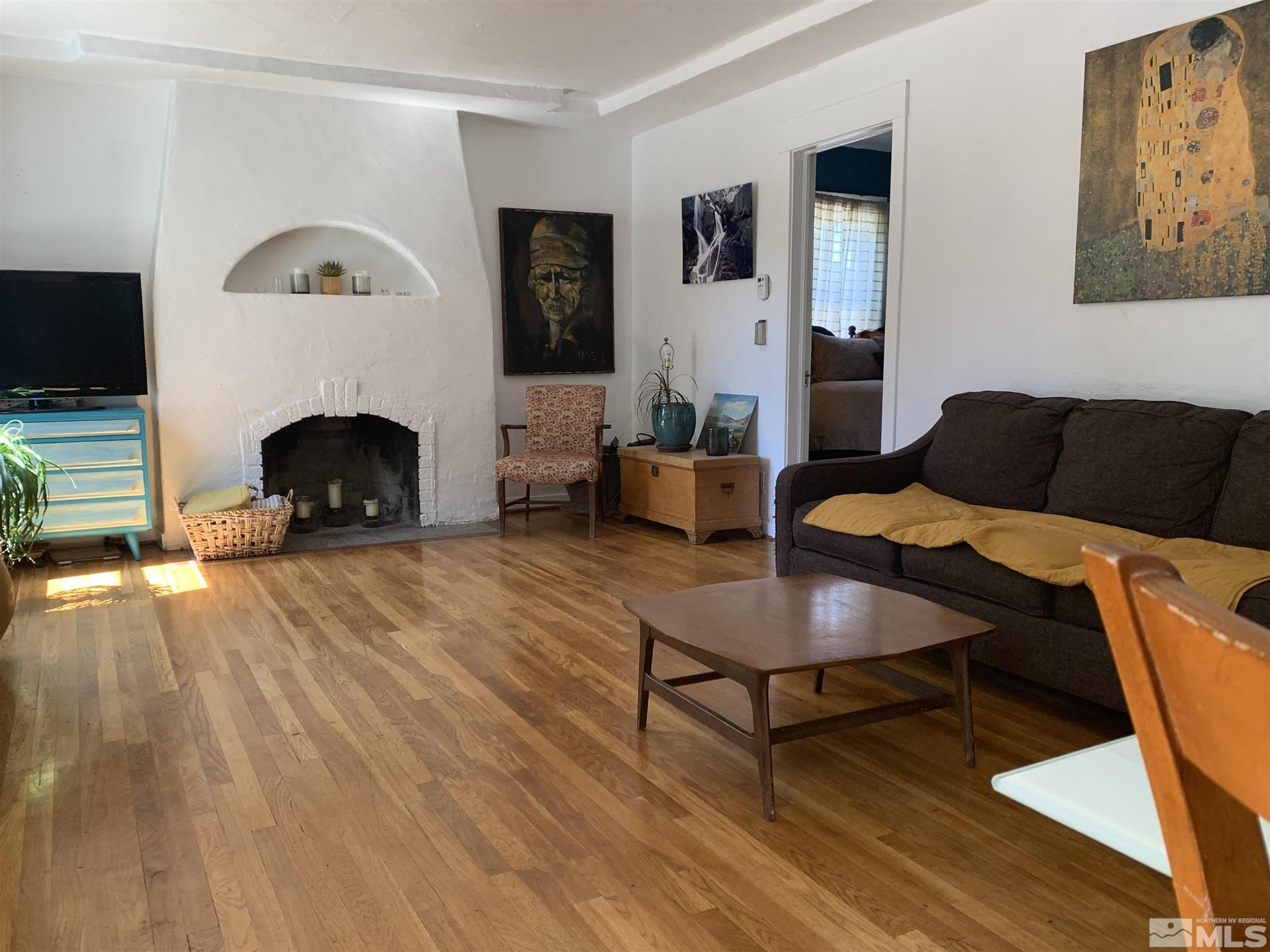 1230 Watt Street Reno, NV 89509 - Photo 1 of 18 a living room with furniture and a fireplace