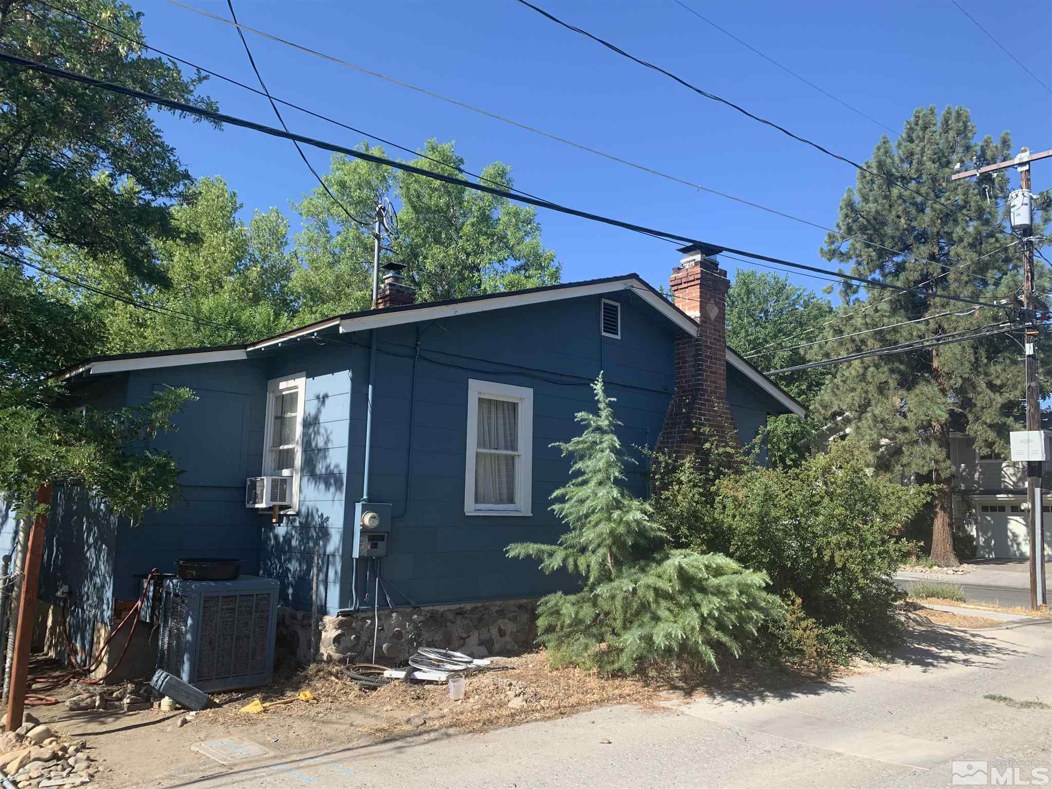 1230 Watt Street Reno, NV 89509 - Photo 12 of 18 a front view of a house with garden