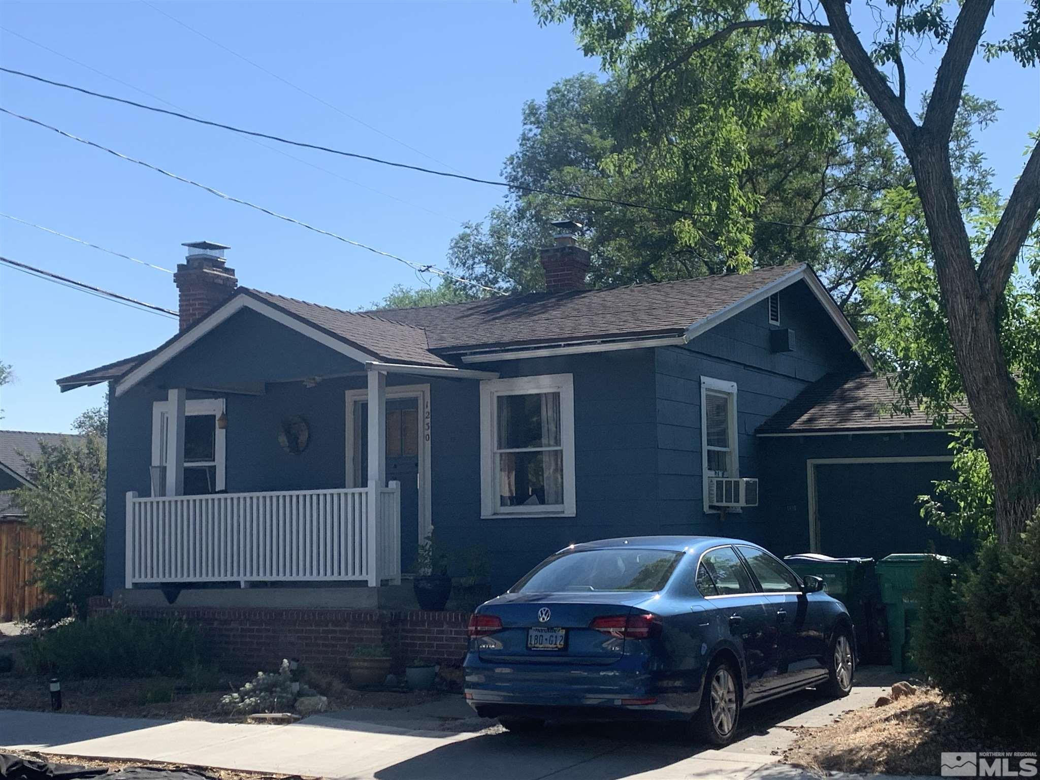 1230 Watt Street Reno, NV 89509 - Photo 4 of 18 a front view of a house with a garden