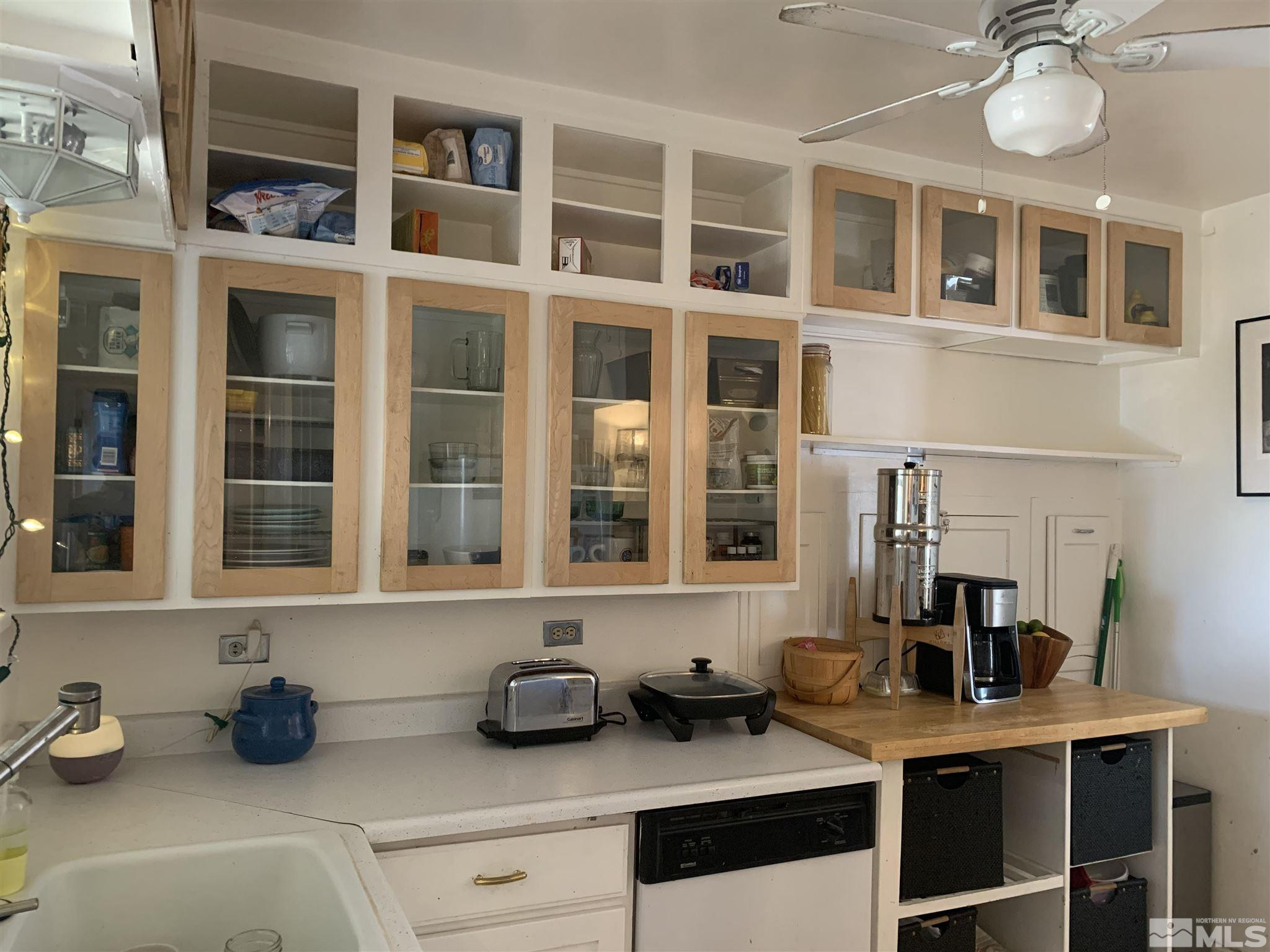 1230 Watt Street Reno, NV 89509 - Photo 5 of 18 a view of a kitchen with a sink and cabinets