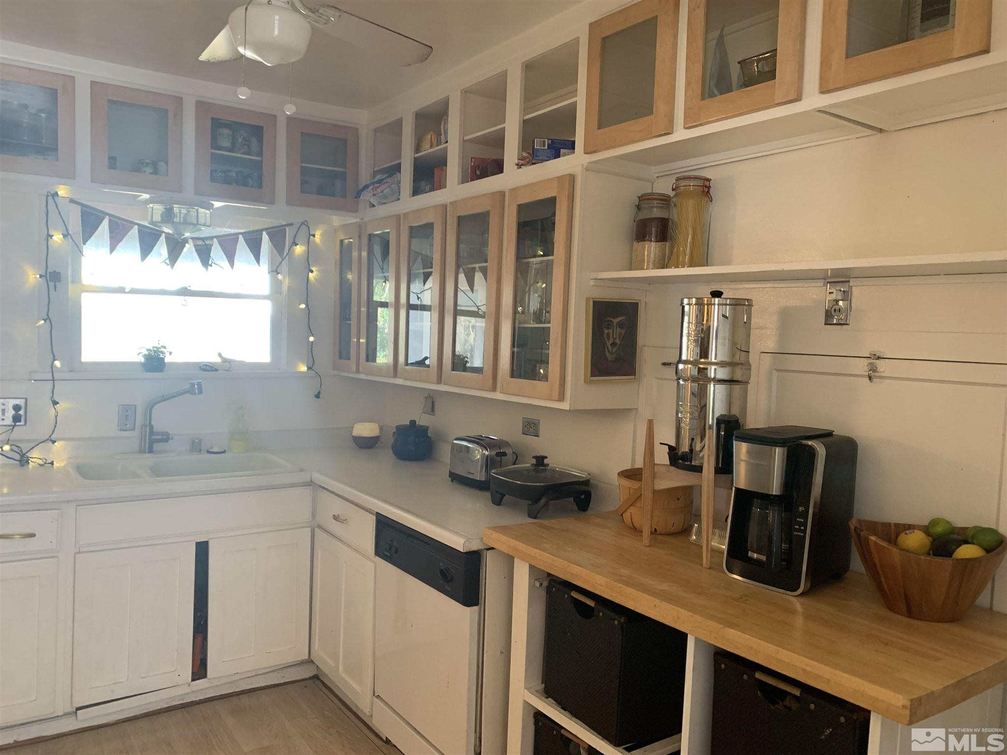 1230 Watt Street Reno, NV 89509 - Photo 6 of 18 a kitchen with cabinets and window