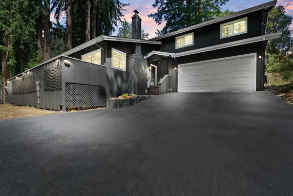 a view of a house with a garage