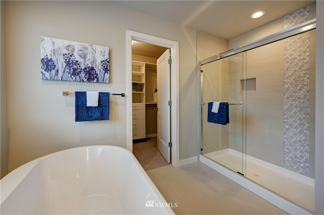 8609 244th Street Southwest, Unit 6 Edmonds, WA 98026 - Photo 12 of 27 a bathroom with a bathtub and a shower