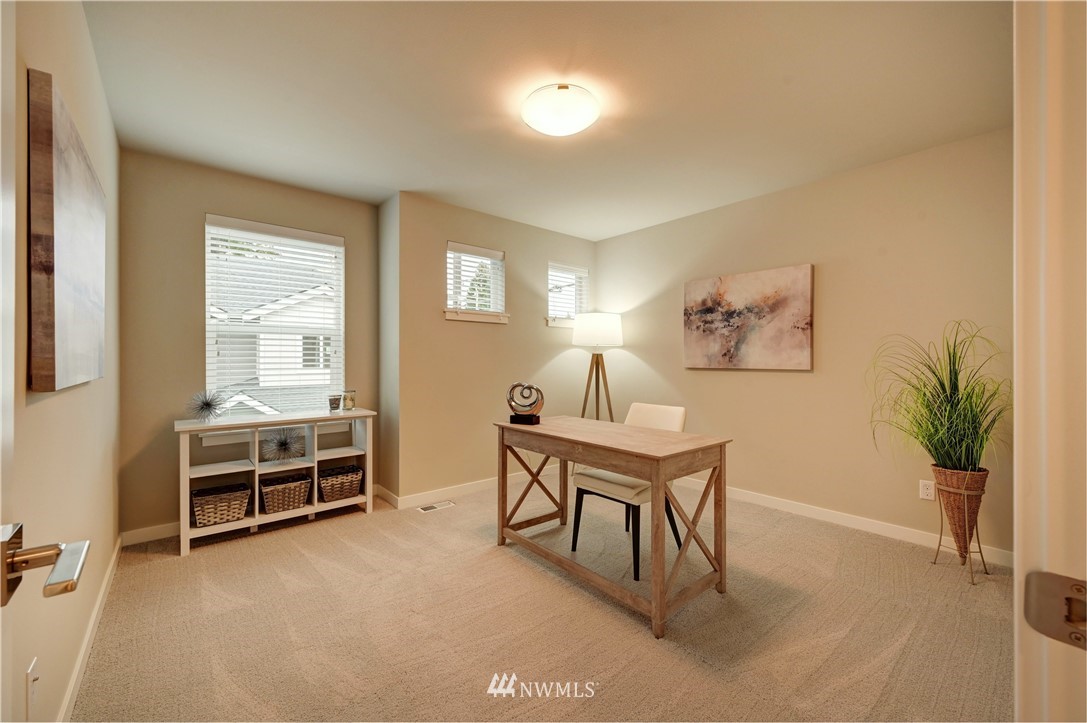 8609 244th Street Southwest, Unit 6 Edmonds, WA 98026 - Photo 17 of 27 a view of a workspace with furniture and a window