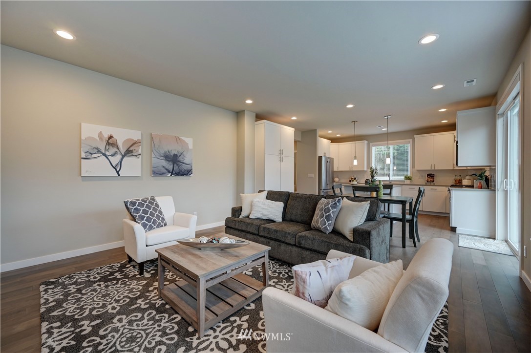 8609 244th Street Southwest, Unit 6 Edmonds, WA 98026 - Photo 8 of 27 a living room with furniture and kitchen view