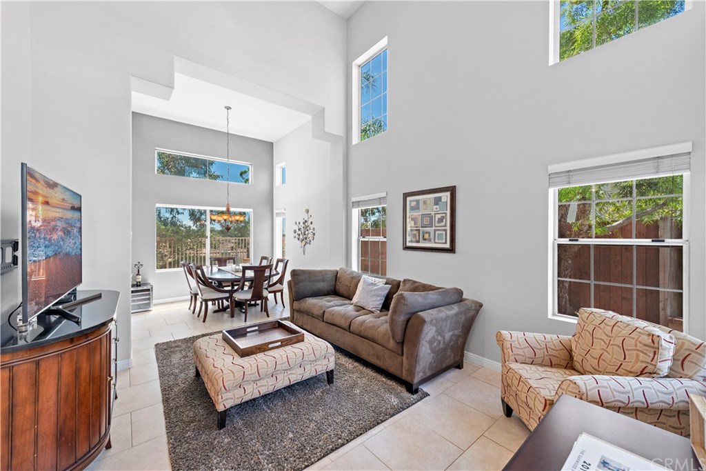 Soaring ceilings and huge windows throughout this home provide beautiful natural light!