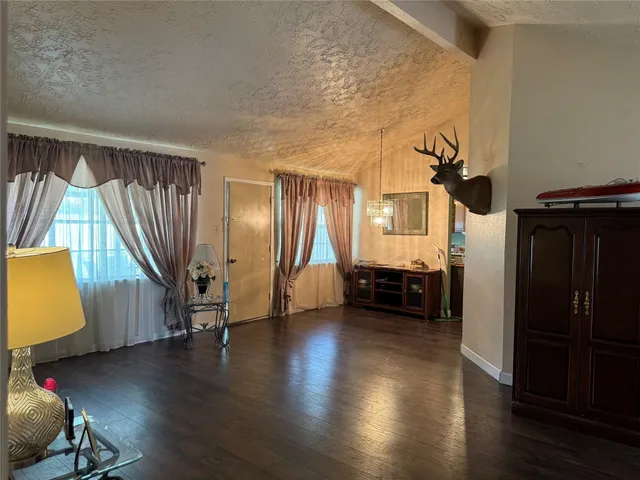 a view of livingroom with furniture and wooden floor