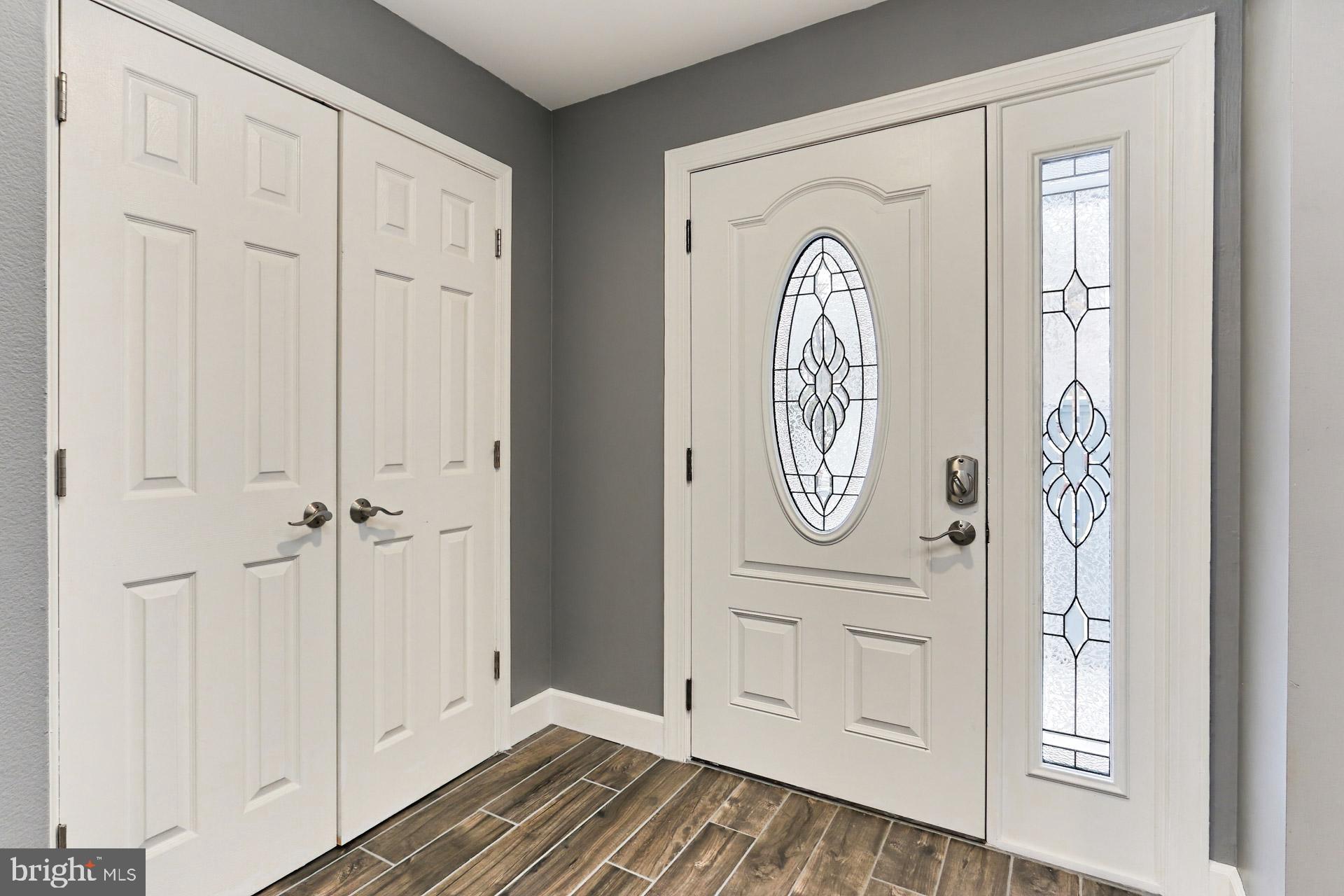 2071 Wethersfield Court Reston, VA 20191 - Photo 2 of 34 Lead glass embellished door welcomes you in!