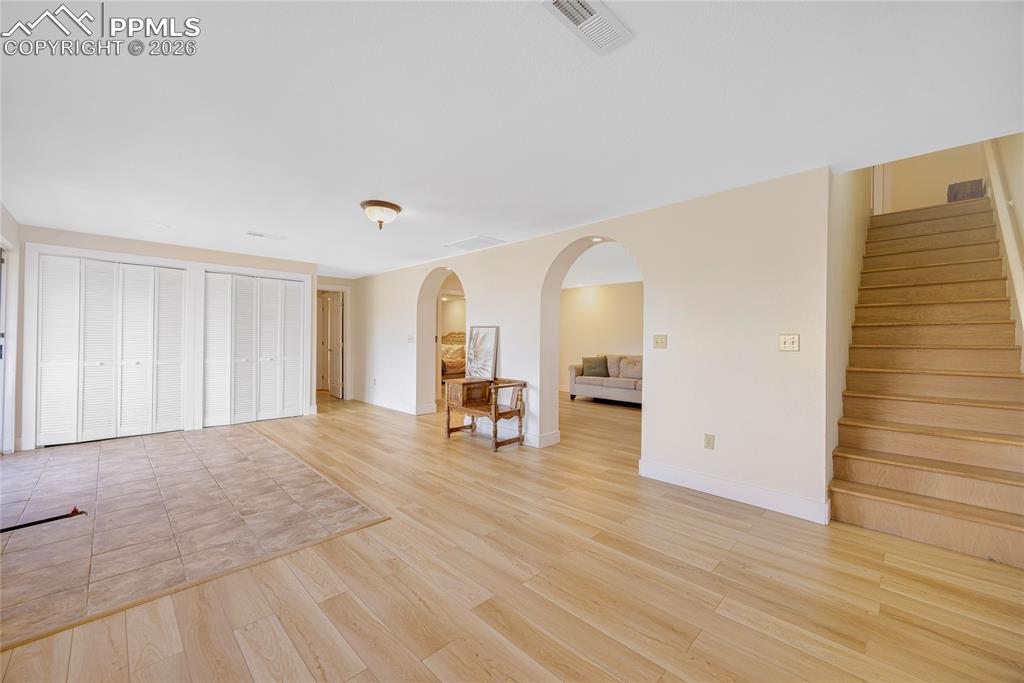 17520 Fremont Fort Road Peyton, CO 80831 - Photo 26 of 42 The property features a foyer with hardwood flooring and feature wall