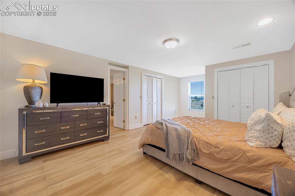 17520 Fremont Fort Road Peyton, CO 80831 - Photo 29 of 42 This room features light-toned flooring, white walls, and a window providing natural illumination