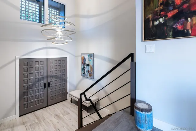 a view of livingroom with furniture and staircase
