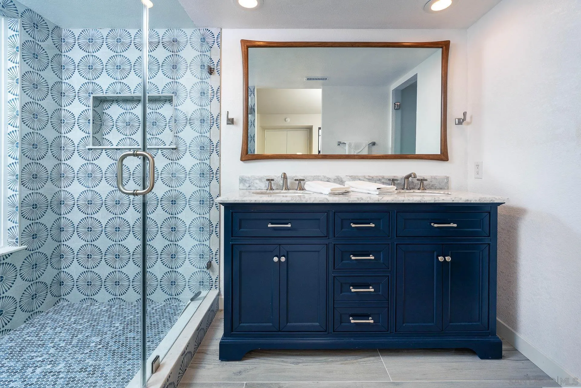 1060 America Way Del Mar, CA 92014 - Photo 21 of 61 a bathroom with a sink and a mirror