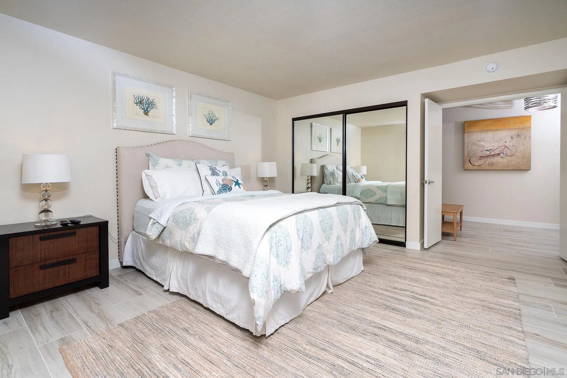 1060 America Way Del Mar, CA 92014 - Photo 22 of 61 a bedroom with a bed and a night stand