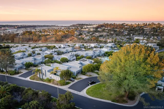 an aerial view of residential building and lake view