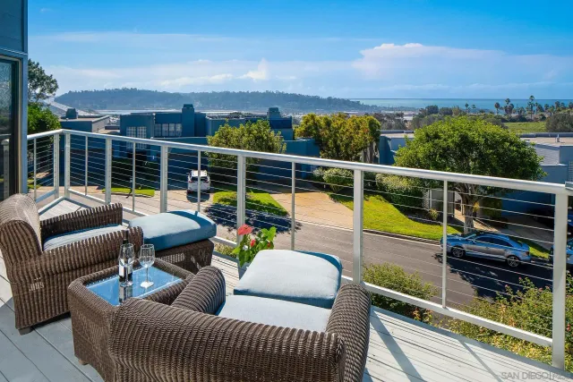 a view of a chairs in the roof deck