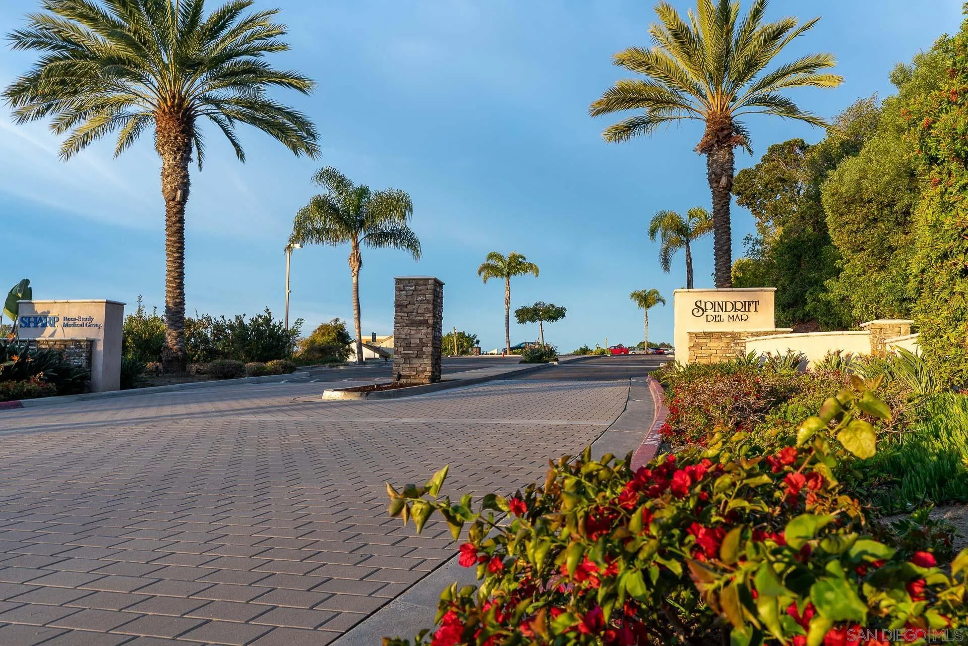 1060 America Way Del Mar, CA 92014 - Photo 46 of 61 a view of a street with a building and palm trees