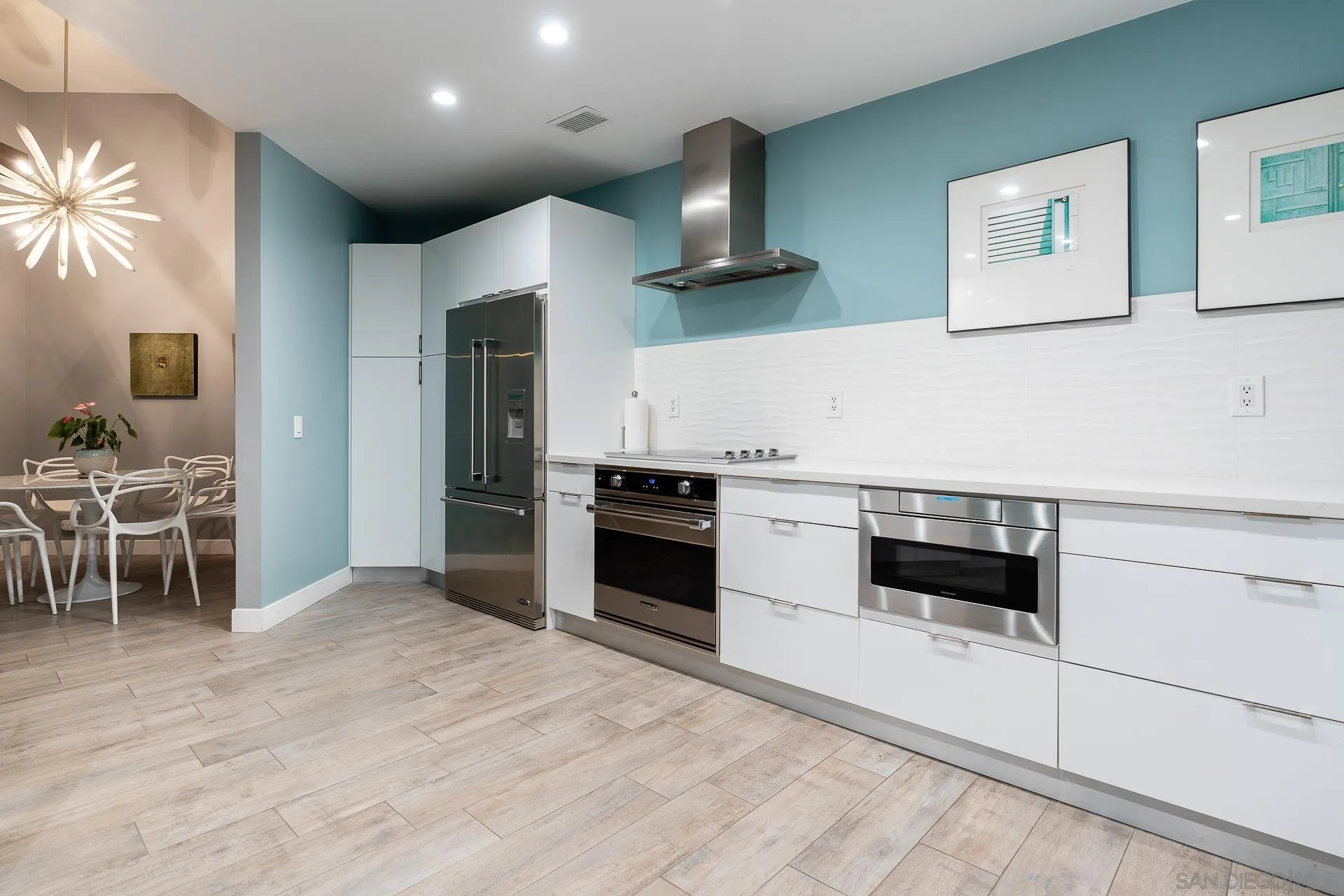 1060 America Way Del Mar, CA 92014 - Photo 9 of 61 a kitchen with a stove and a microwave