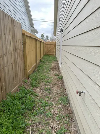 a view of a wooden fence