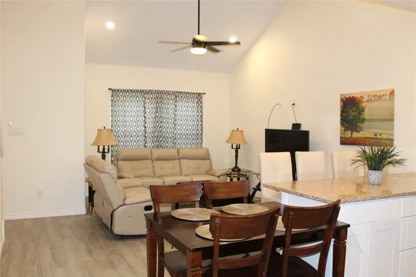 a view of a dining room with furniture