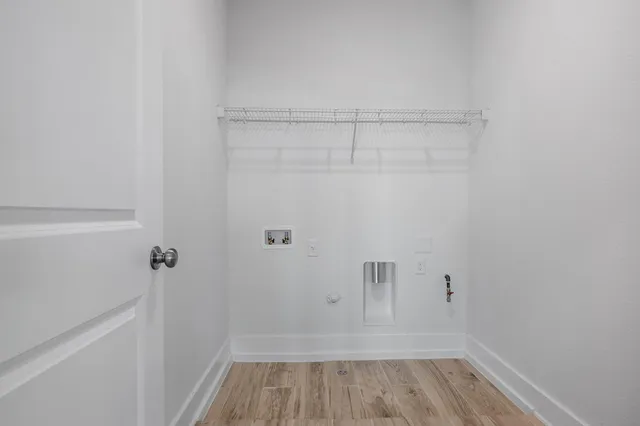 a view of a room with racks on the wall