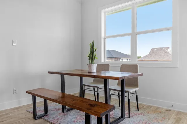 a view of a workspace with furniture