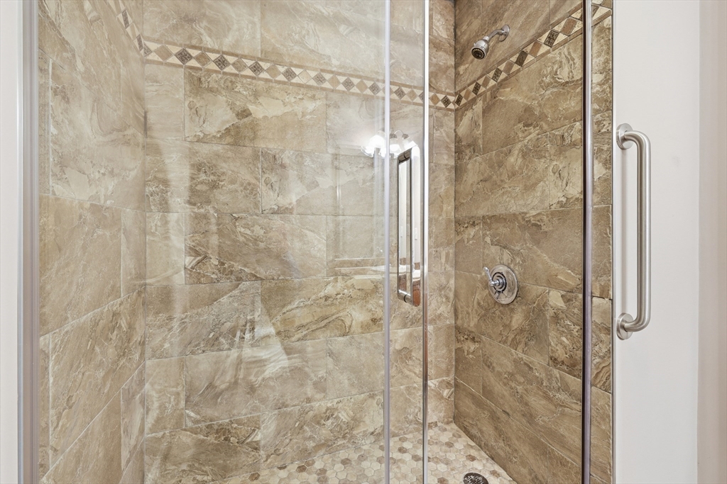 9 Rock Marsh Road, Unit B Wareham, MA 02571 - Photo 26 of 41 a bathroom with a shower