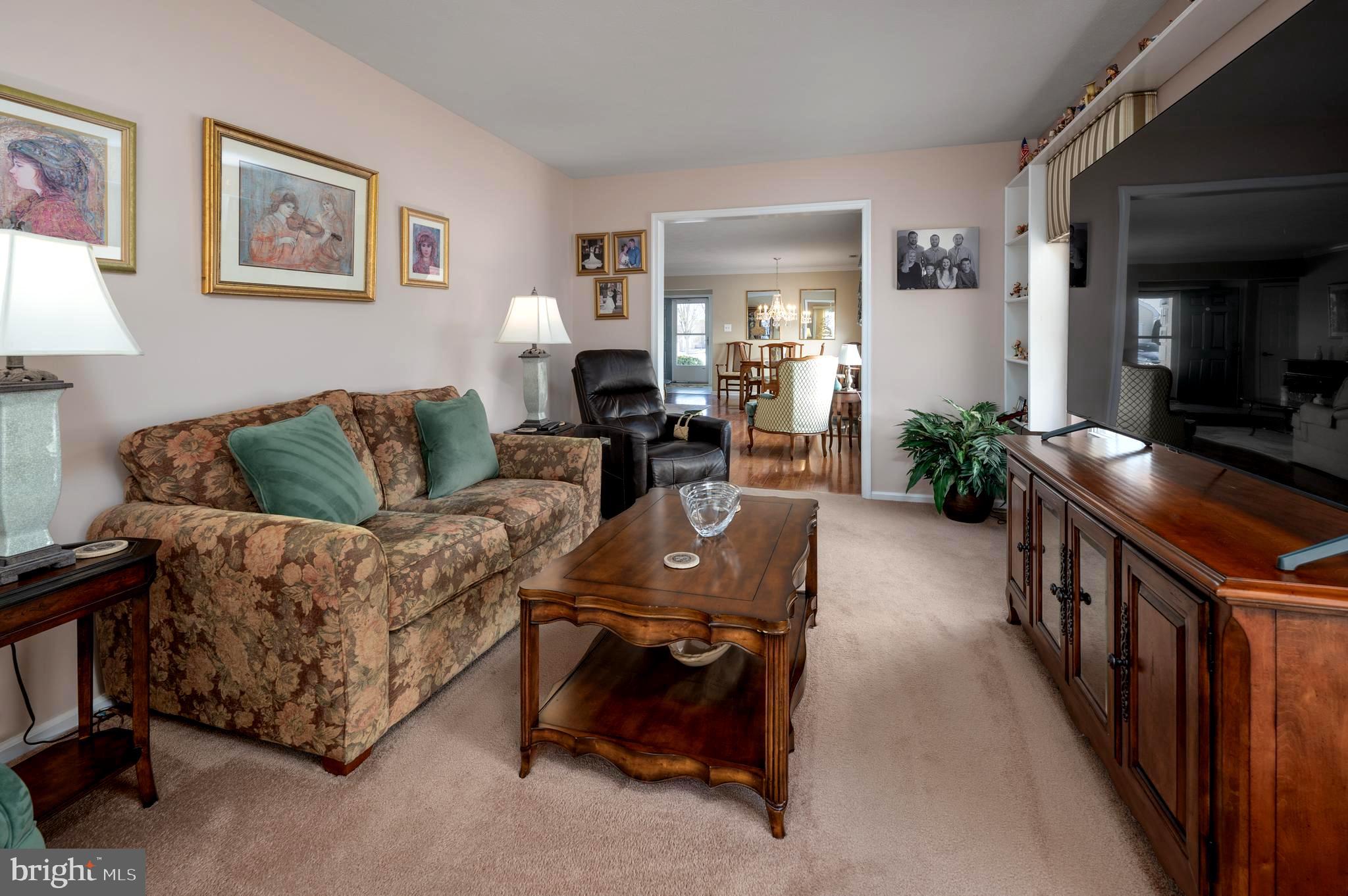 515 Hydrangea Drive Mount Laurel, NJ 08054 - Photo 12 of 36 a living room with furniture and wooden floor