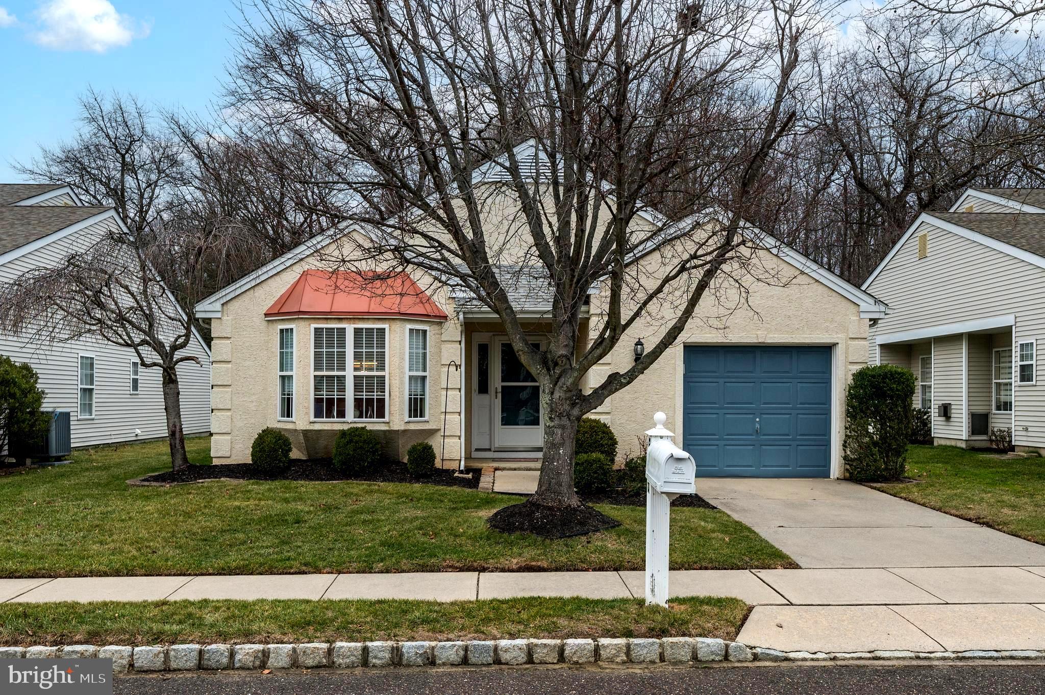 515 Hydrangea Drive Mount Laurel, NJ 08054 - Photo 2 of 36 a front view of a house with a yard