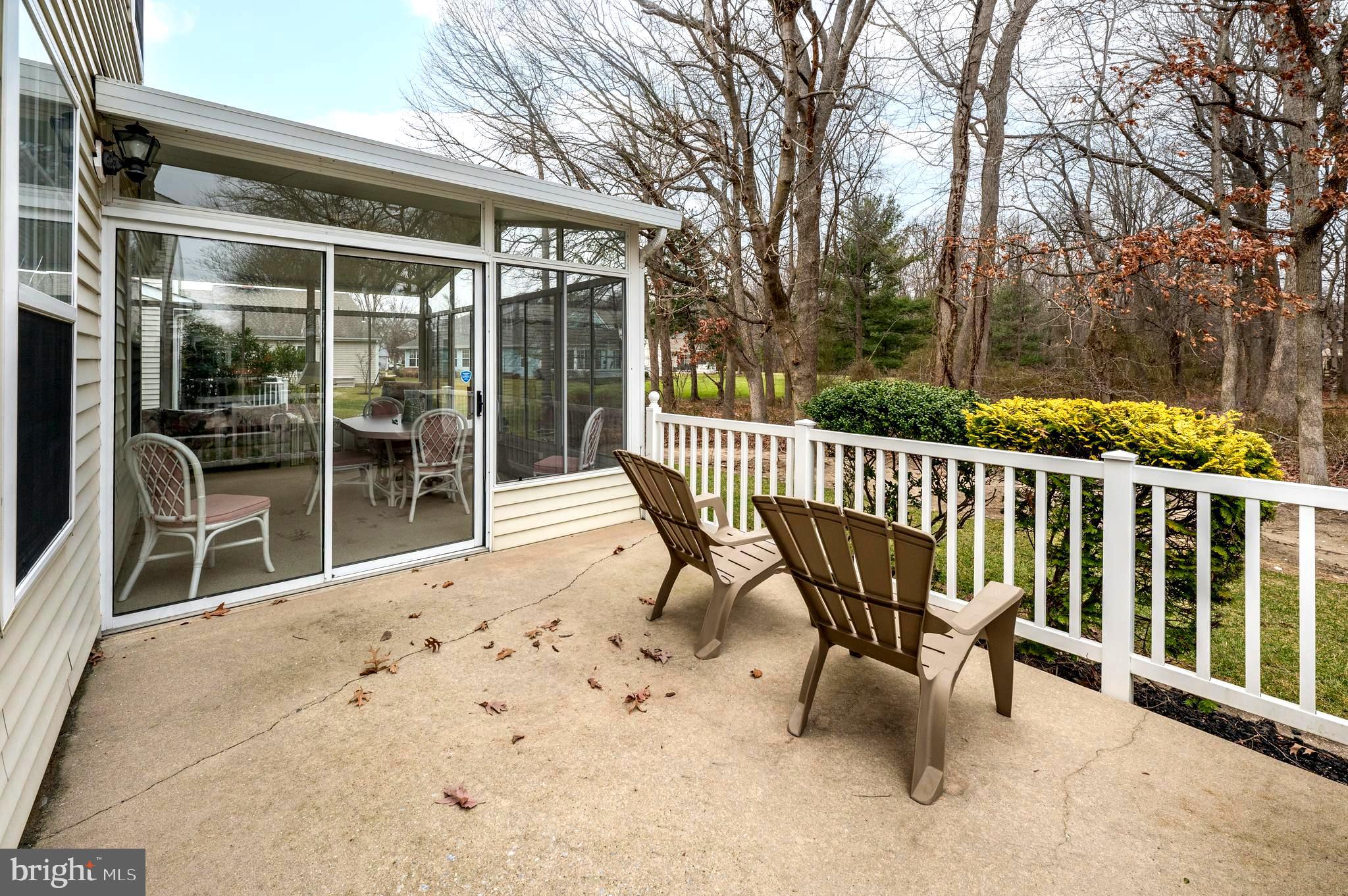 515 Hydrangea Drive Mount Laurel, NJ 08054 - Photo 30 of 36 a view of a chairs with backyard in the house