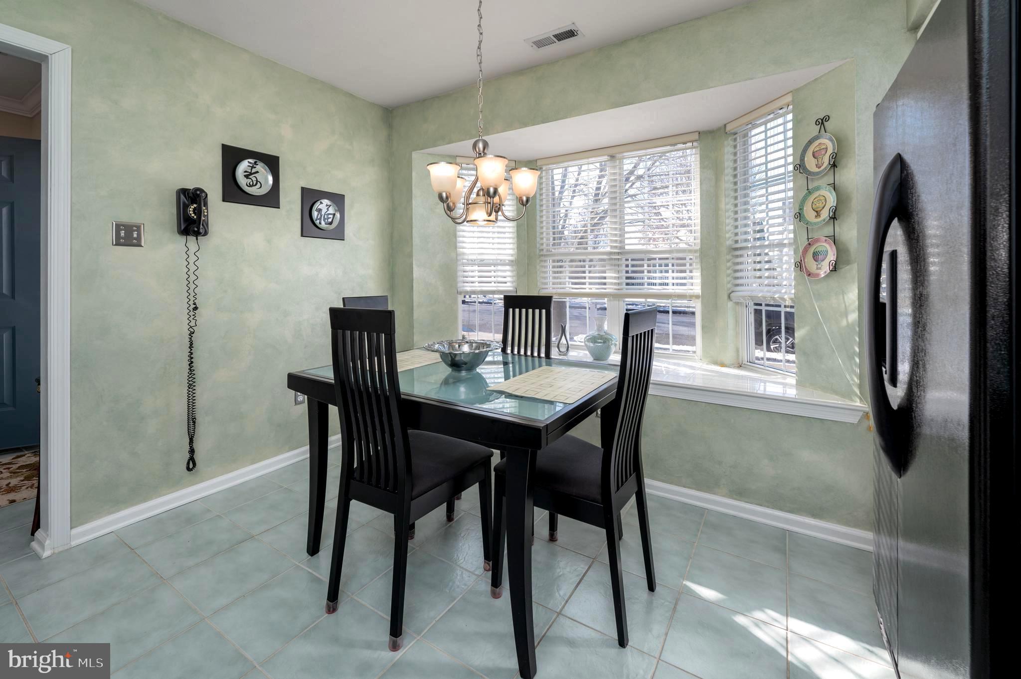 515 Hydrangea Drive Mount Laurel, NJ 08054 - Photo 5 of 36 a view of a dining room with furniture window and outside view