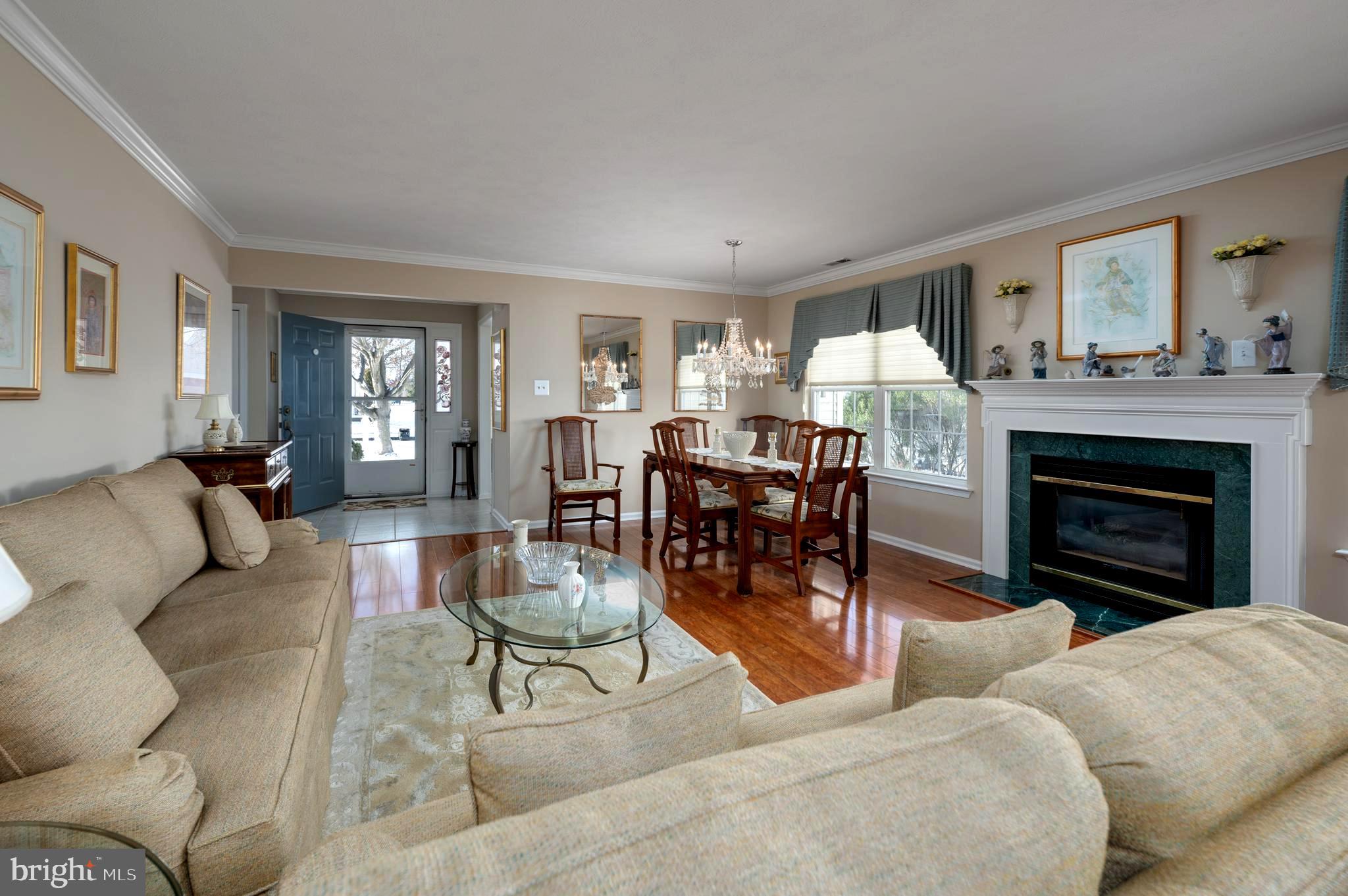 515 Hydrangea Drive Mount Laurel, NJ 08054 - Photo 9 of 36 a living room with furniture and a fireplace