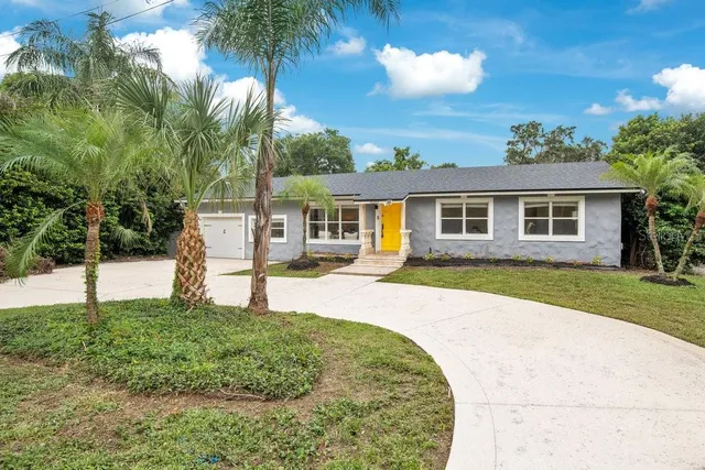 a house view with a garden space
