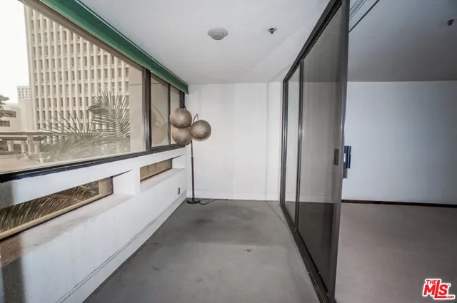 a bathroom with a tub sink vanity and a mirror
