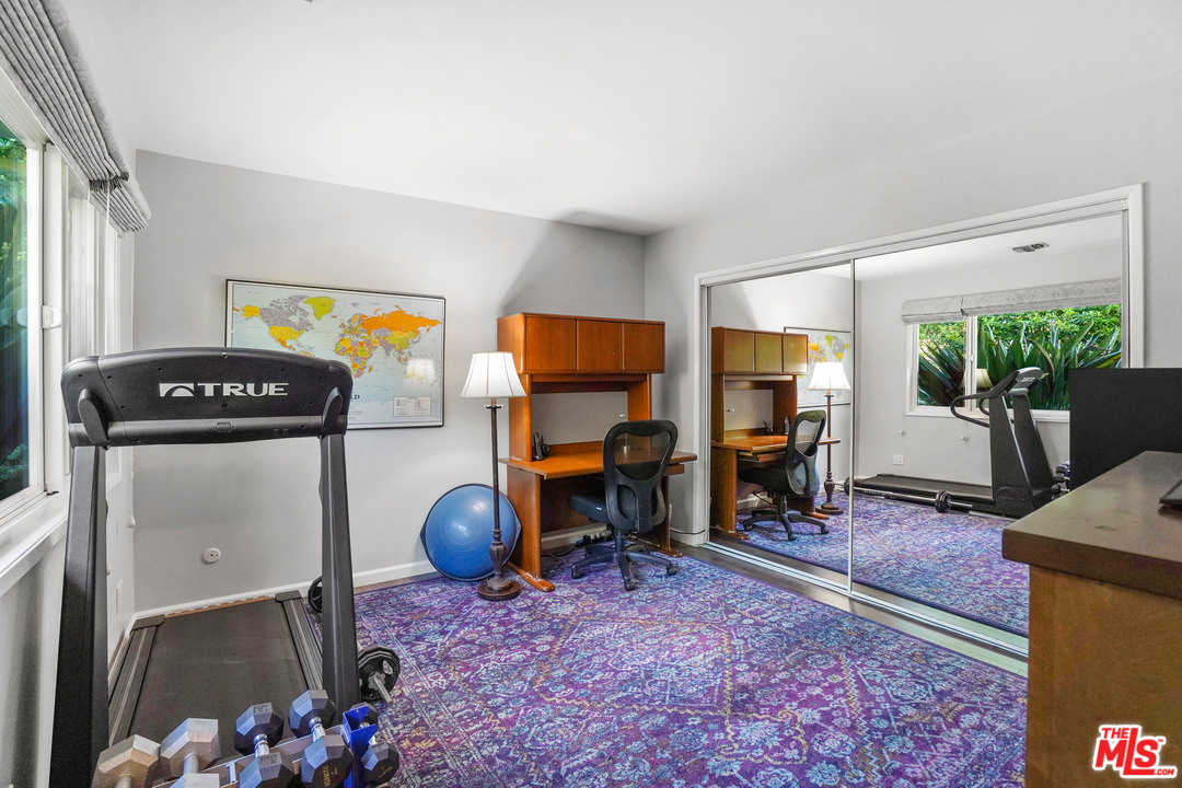 910 Hillcroft Road Glendale, CA 91207 - Photo 24 of 37 a bedroom with furniture and window