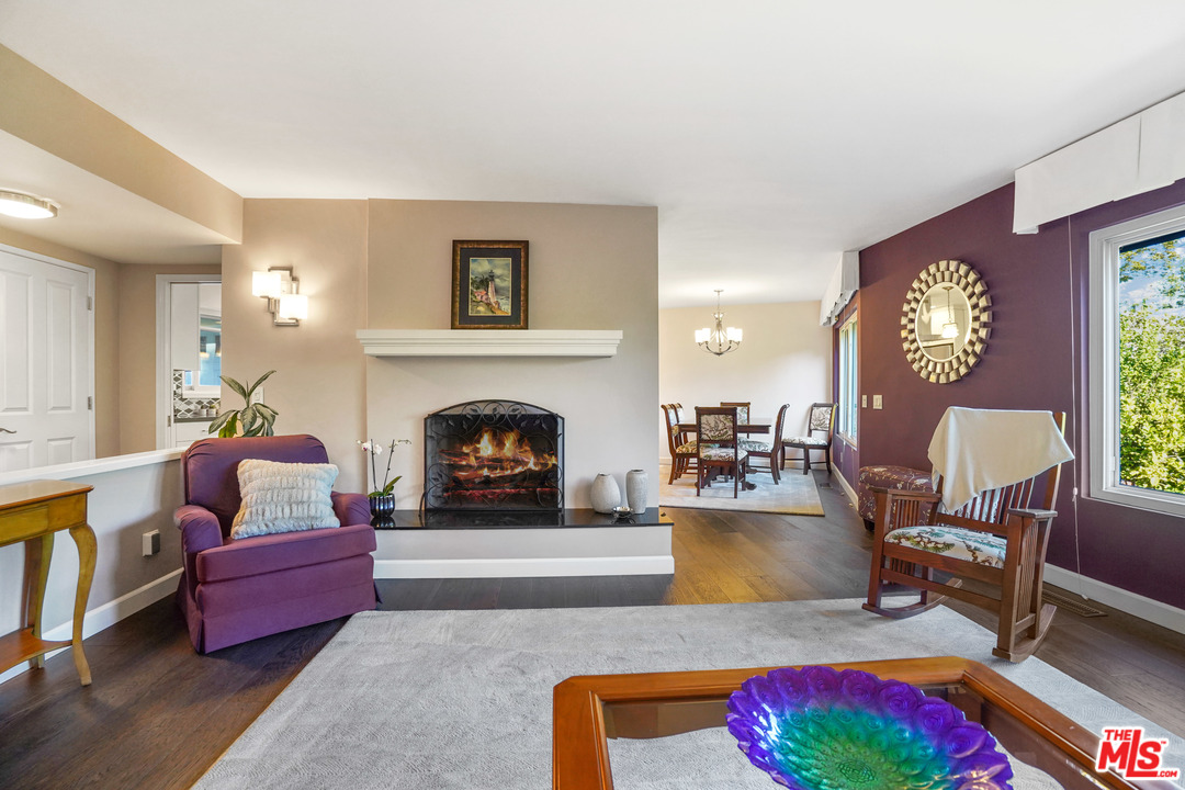 910 Hillcroft Road Glendale, CA 91207 - Photo 6 of 37 a living room with furniture fireplace and rug