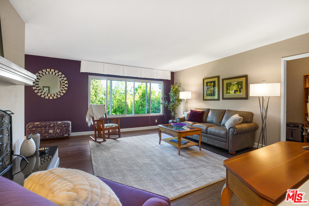 910 Hillcroft Road Glendale, CA 91207 - Photo 7 of 37 a living room with furniture and a large window