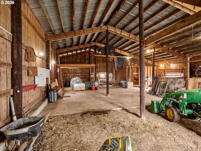 a view of an empty room with racks on the wall
