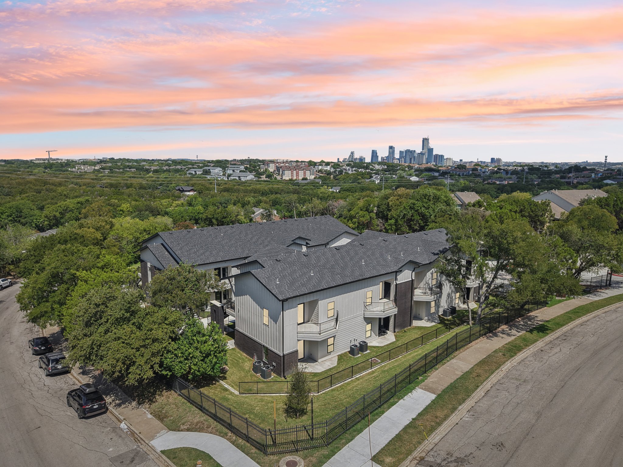 2450 Wickersham Lane, Unit 1916 Austin, TX 78741 - Photo 28 of 37 an aerial view of a house with a garden