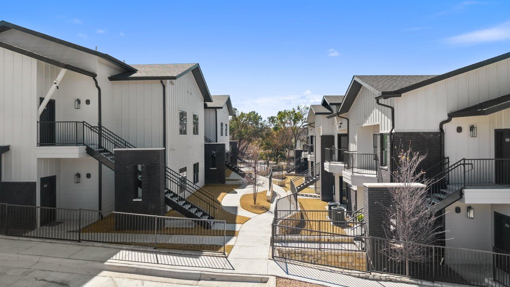 2450 Wickersham Lane, Unit 1916 Austin, TX 78741 - Photo 30 of 37 a view of a building with entryway