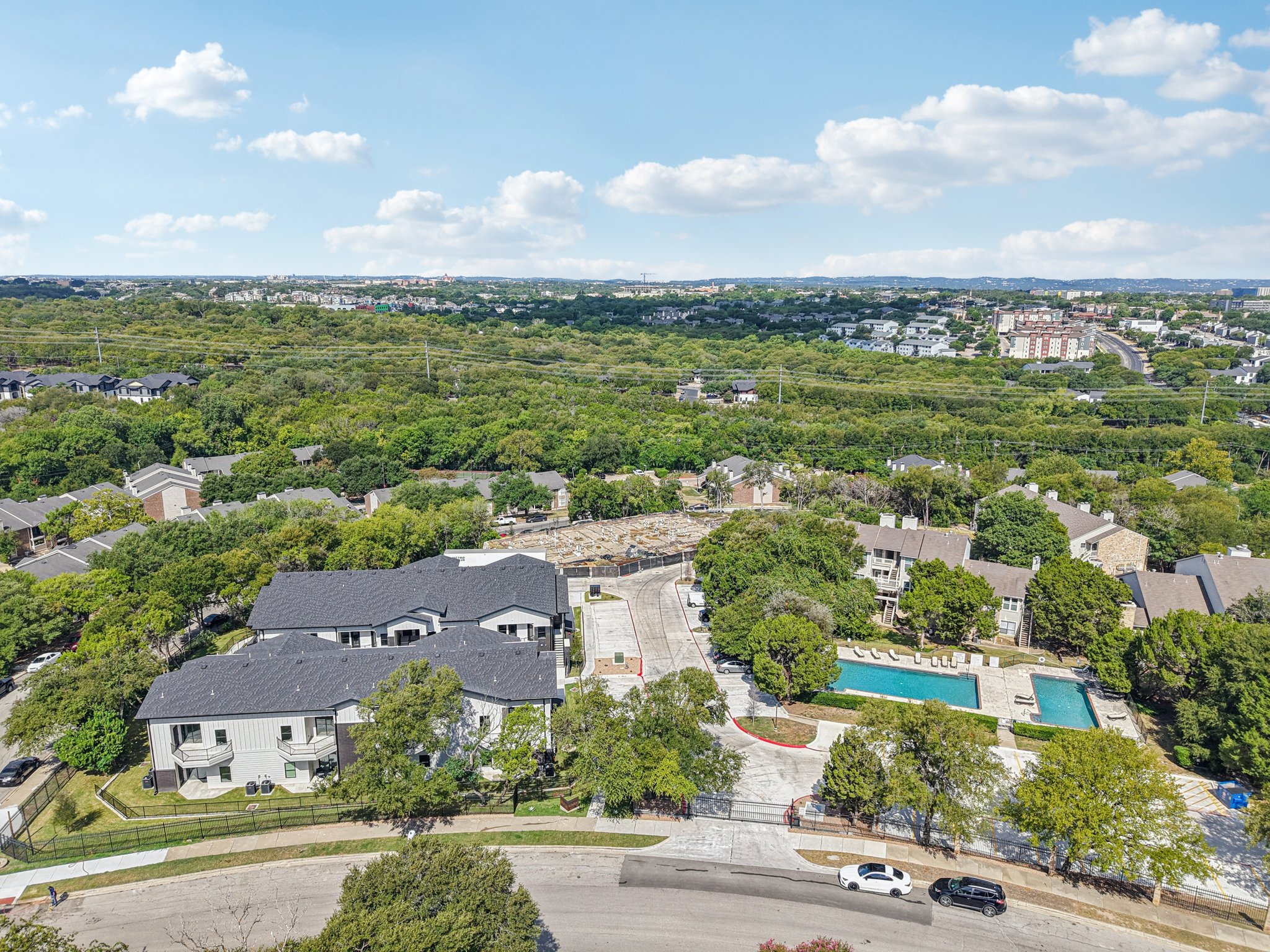 2450 Wickersham Lane, Unit 1916 Austin, TX 78741 - Photo 33 of 37 an aerial view of residential houses with outdoor space and street view