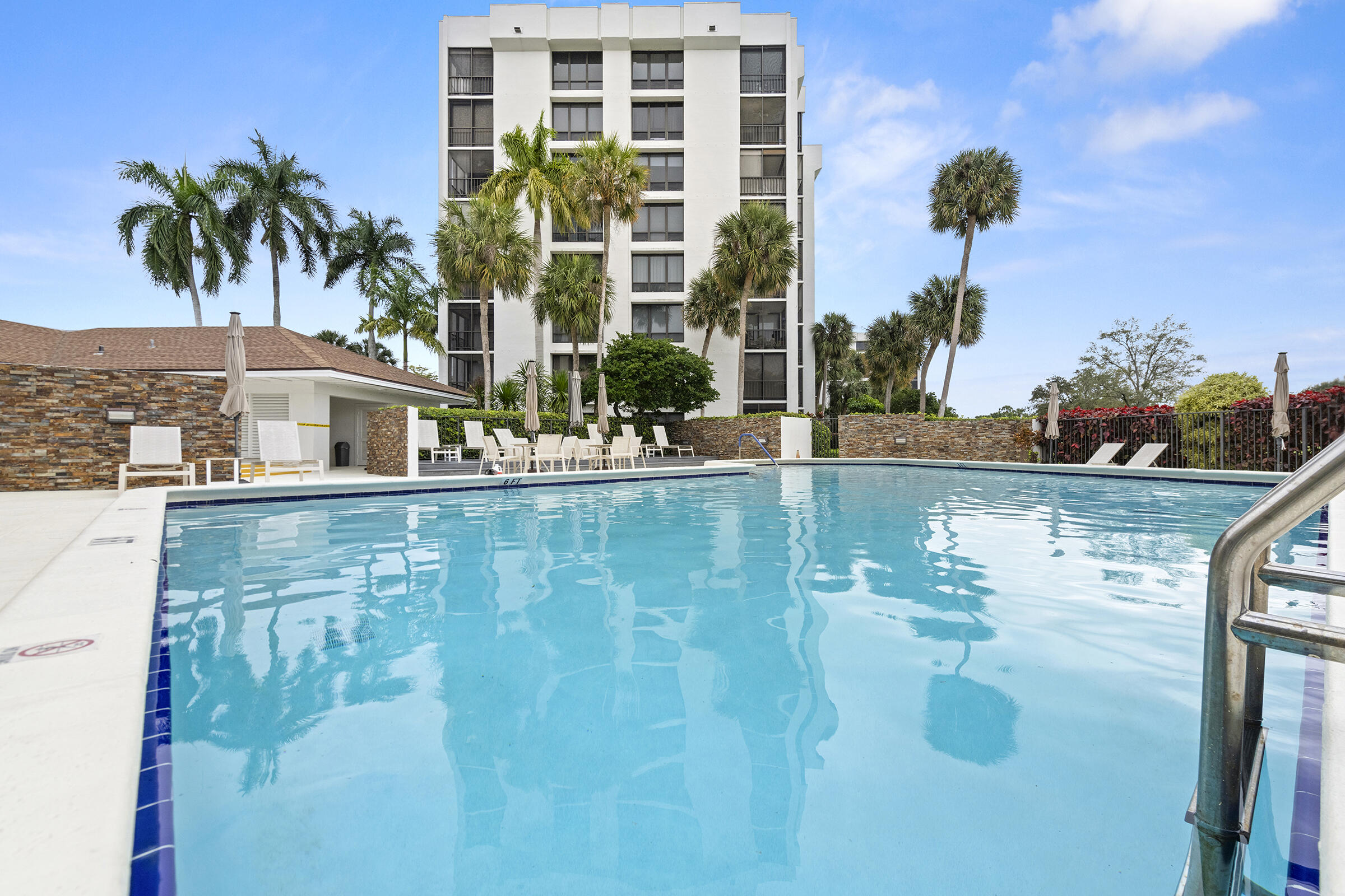 6845 Willow Wood Drive, Unit 3012 Boca Raton, FL 33434 - Photo 28 of 28 a front view of a house with a yard