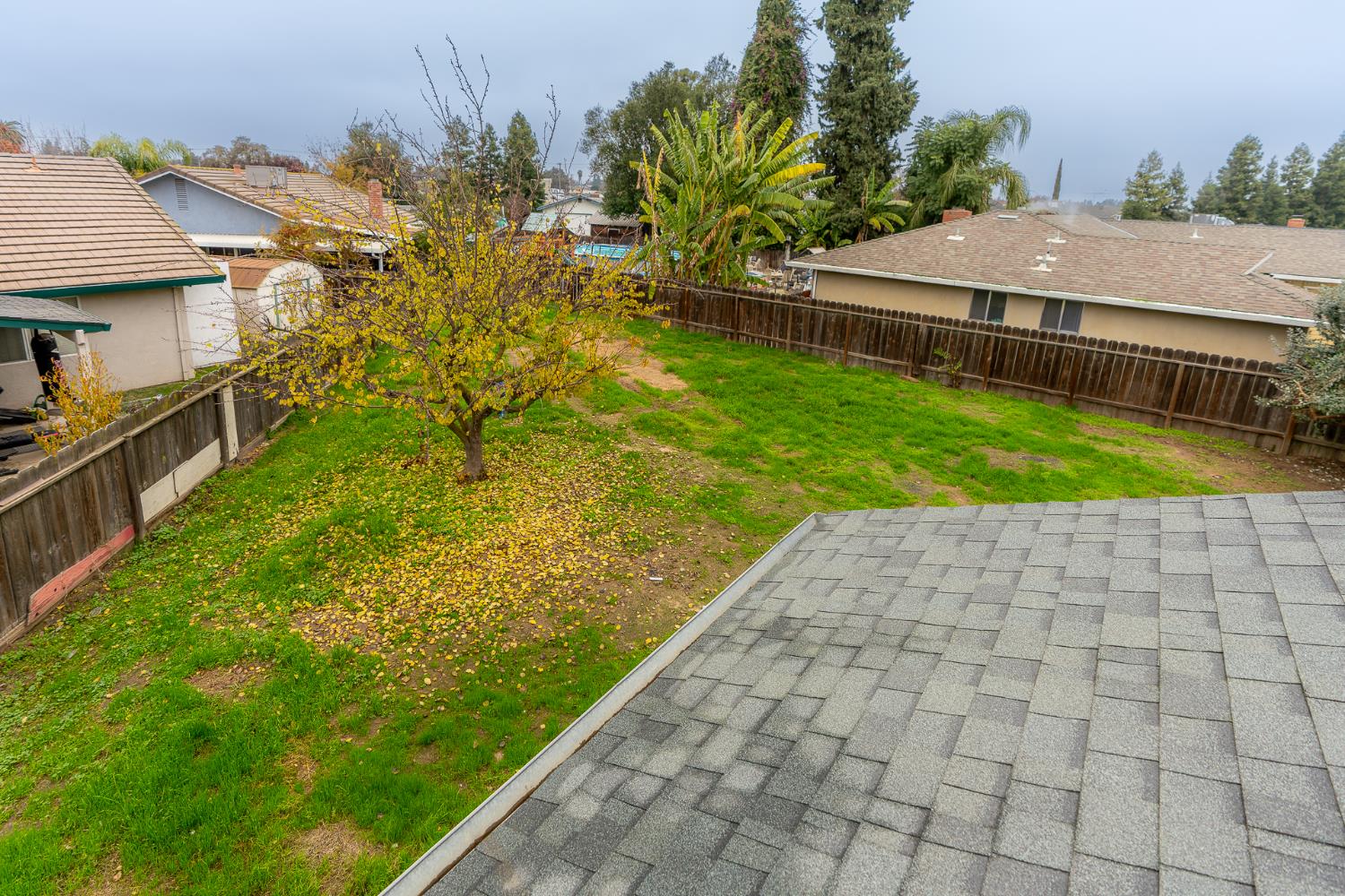 12501 Riverside Road Waterford, CA 95386 - Photo 20 of 24 a view of a yard with an outdoor space