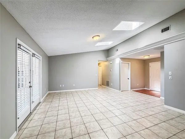 a view of an empty room and window