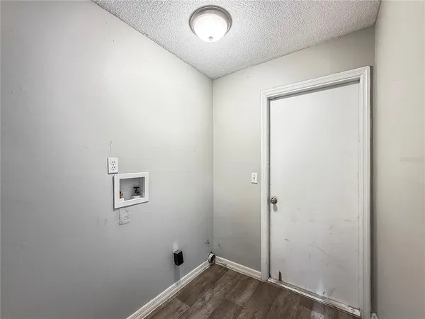 an empty room with a empty space and a window